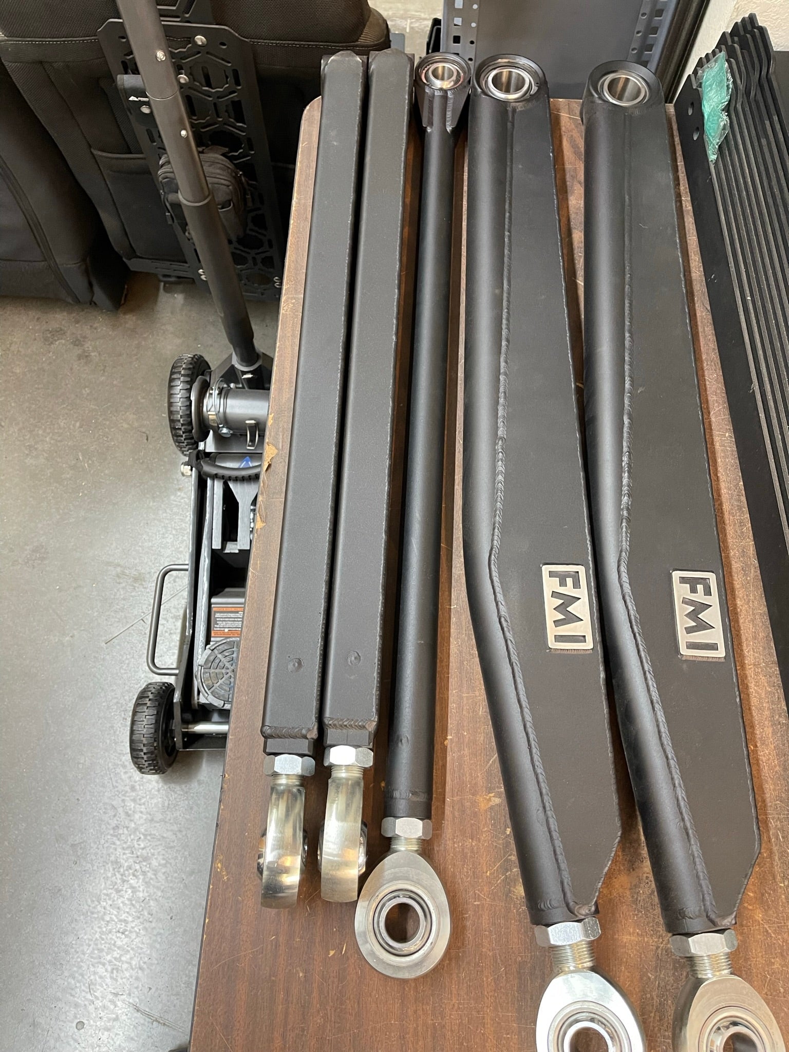 Long travel 5-link rear suspension conversion kit for 2017-2020 Raptor and F150, featuring durable components for 19 inches of travel.