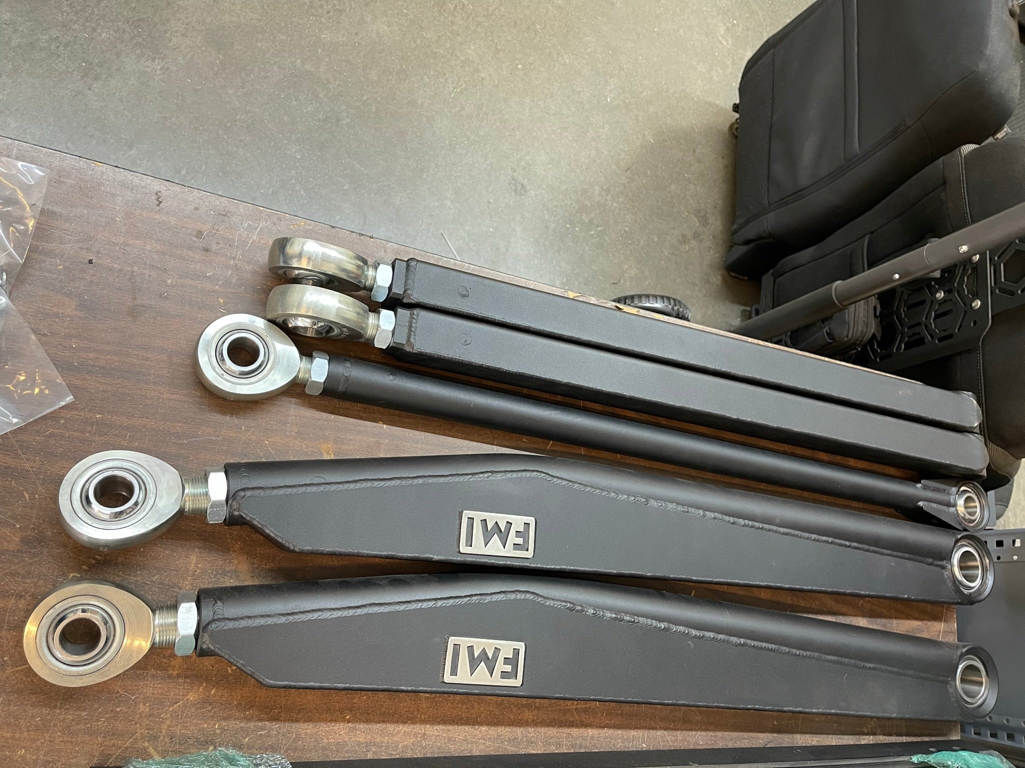 Long travel 5-link rear suspension conversion kit for 2017-2020 Raptor and F150, featuring durable components and 19 inches of travel.