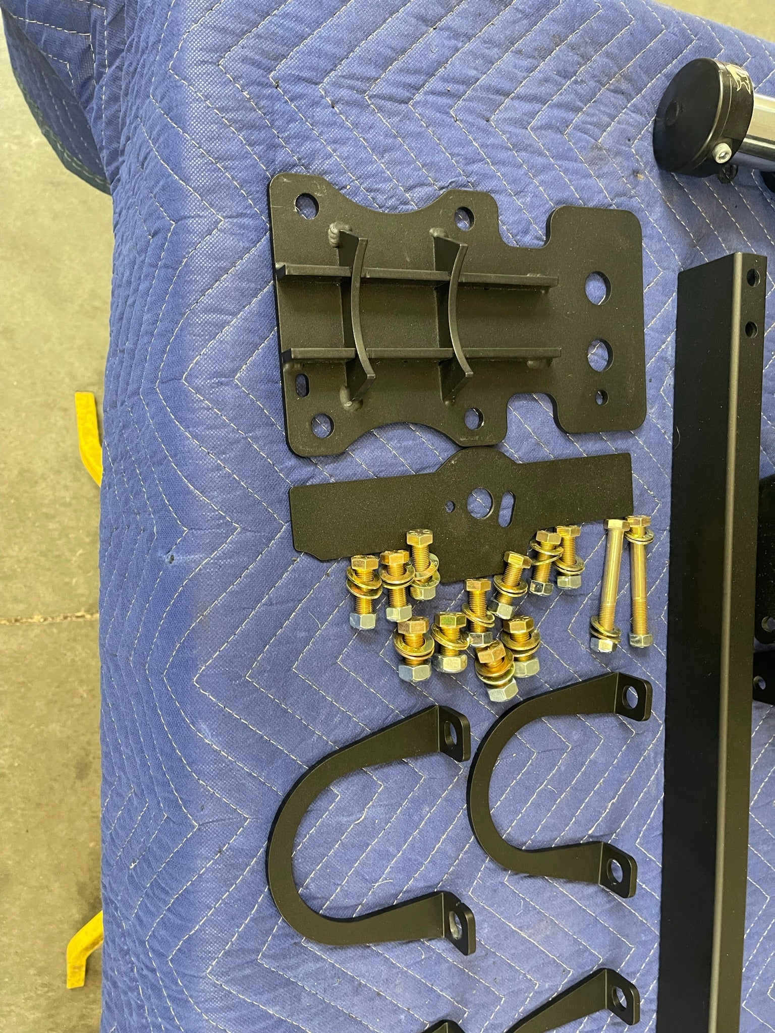 Rear bump stop kit for 2017-2020 Raptor and 2015-2024 F150, featuring mounting brackets and hardware for installation.