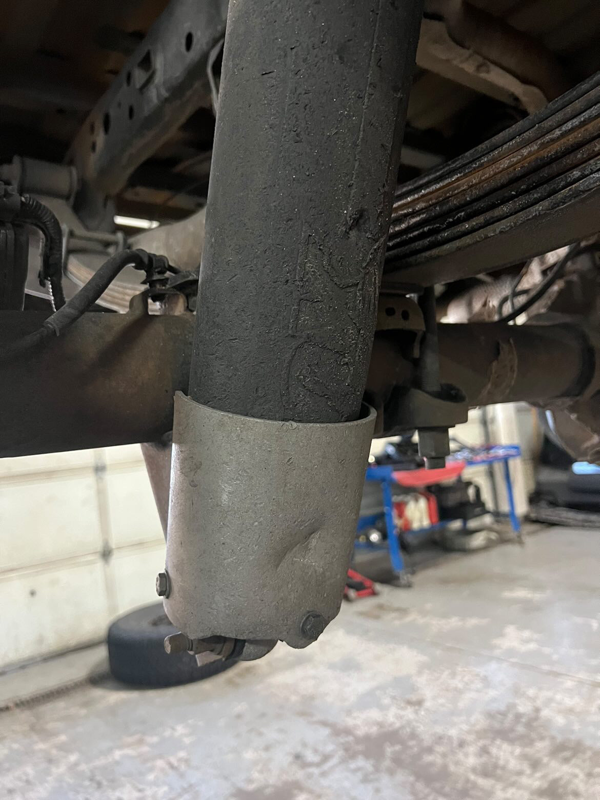 Rear shock guard for 2017-2024 Ford Raptor, designed to protect the shock absorber from damage.