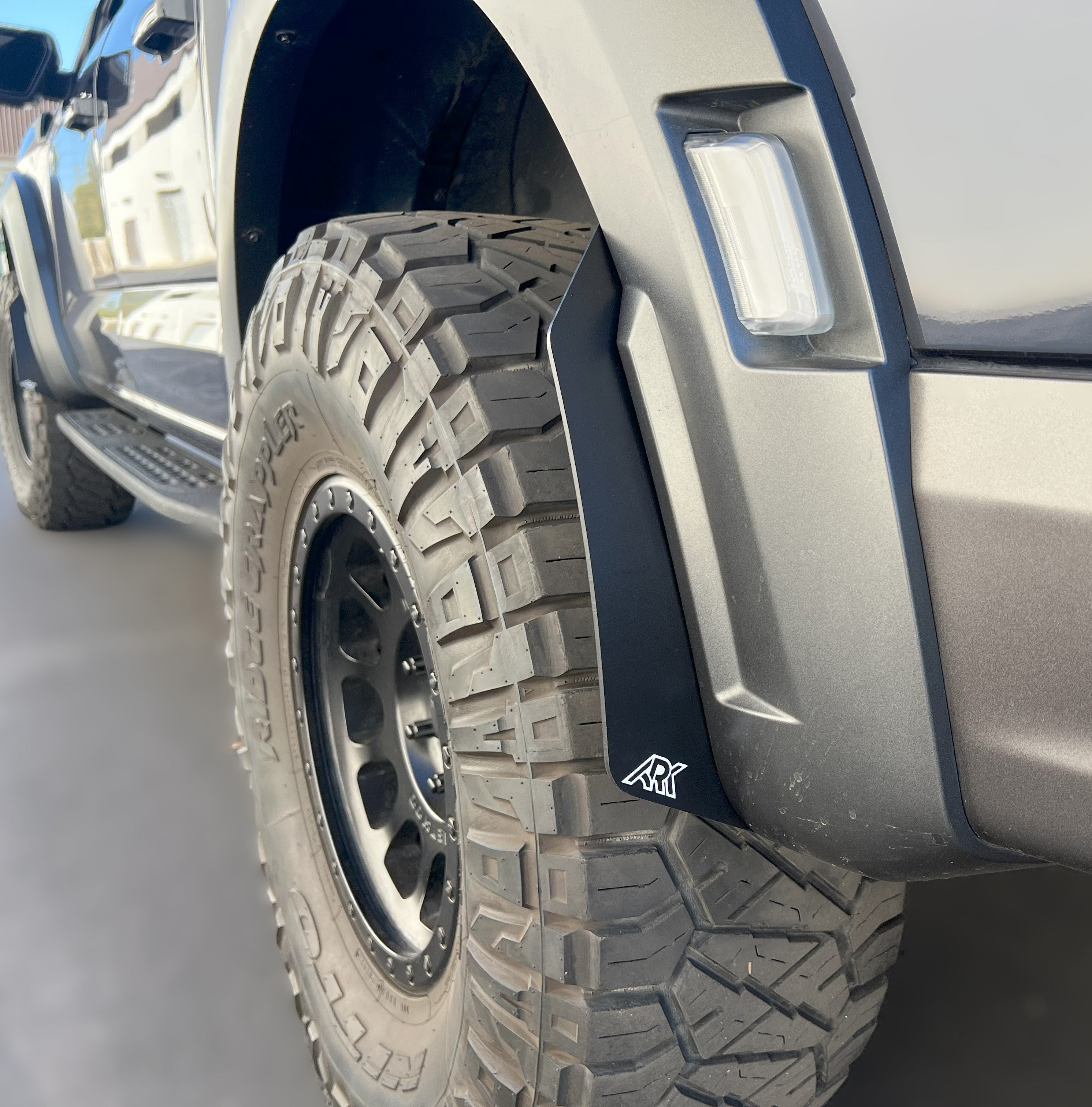2021+ Ford Raptor Micro Flares enhancing tire coverage and protection, designed for off-road performance and style.