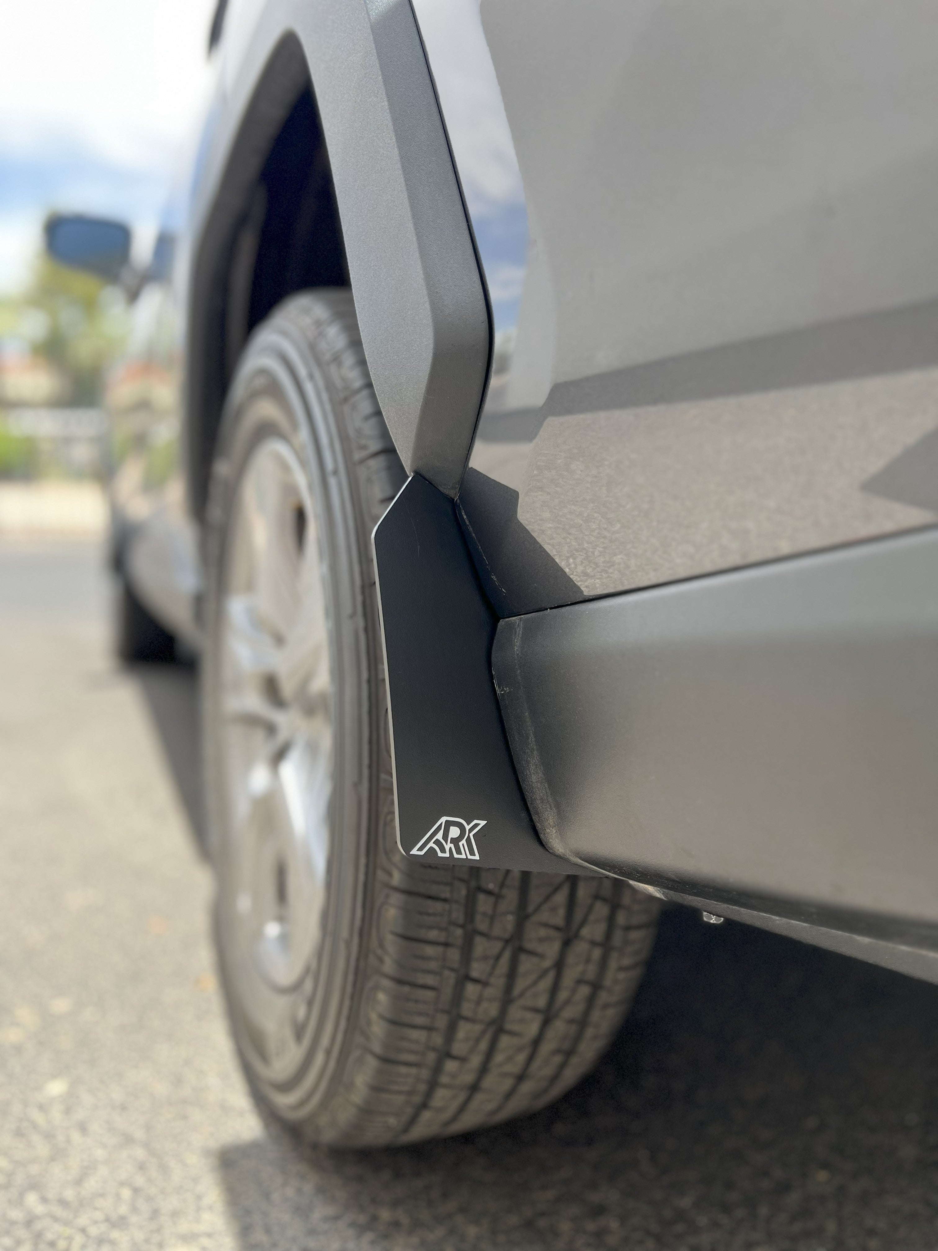 TriXPoly Micros mud flaps for 2019-2025 Toyota RAV4 Gen 5, designed for durability and protection against road debris.