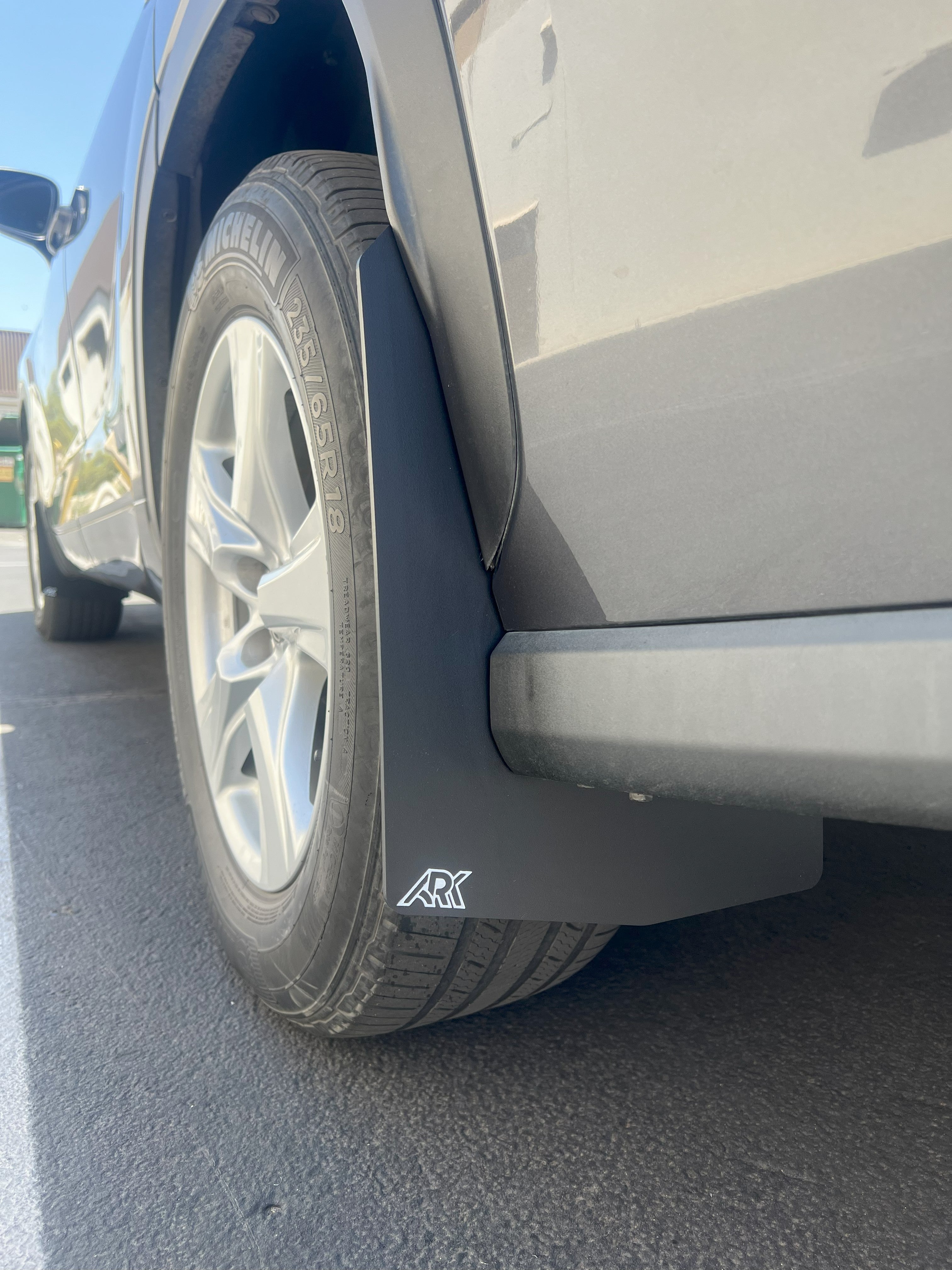 2020+ Toyota Highlander TriXPoly Mid Mudflaps installed on a vehicle, showcasing durability and protection against mud and debris.