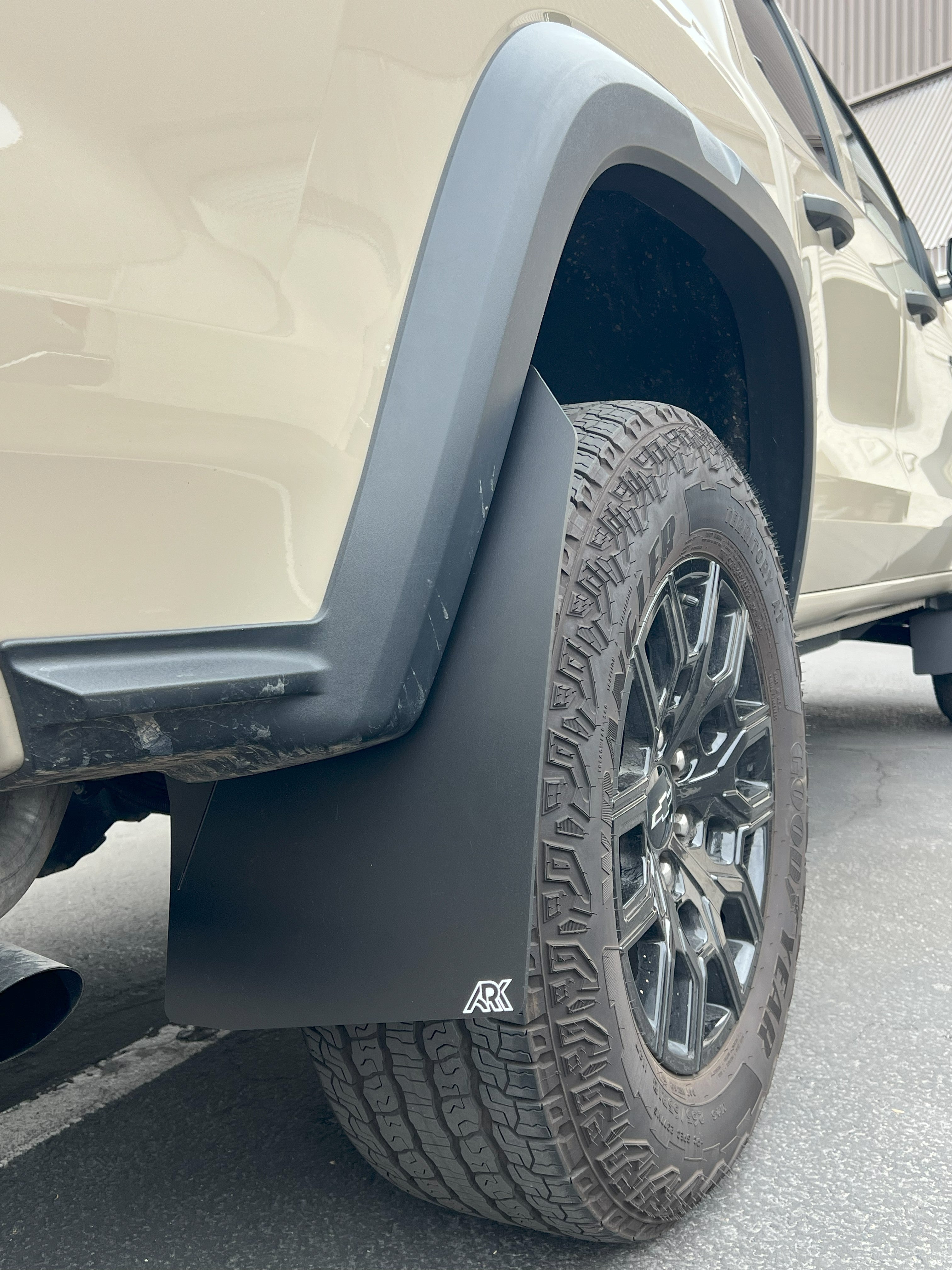 2023+ Chevy Colorado ZR2/Trailboss TriXPoly Mudflaps installed on a truck, showcasing rugged design and tire coverage.
