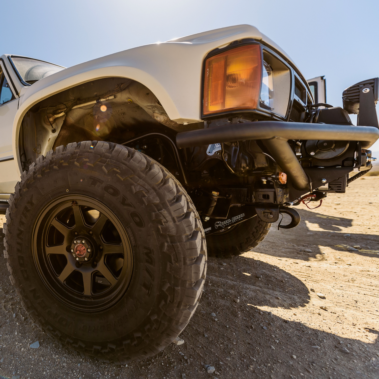 1984-1988 Toyota Pickup fenders showcasing rugged design and fitment on an offroad vehicle with large tires.