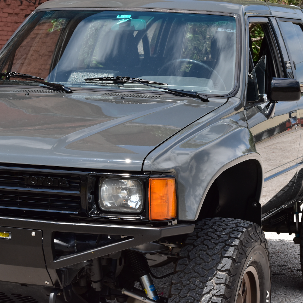 1984-1988 Toyota Pickup fenders showcased on a modified truck, highlighting rugged design and off-road capability.