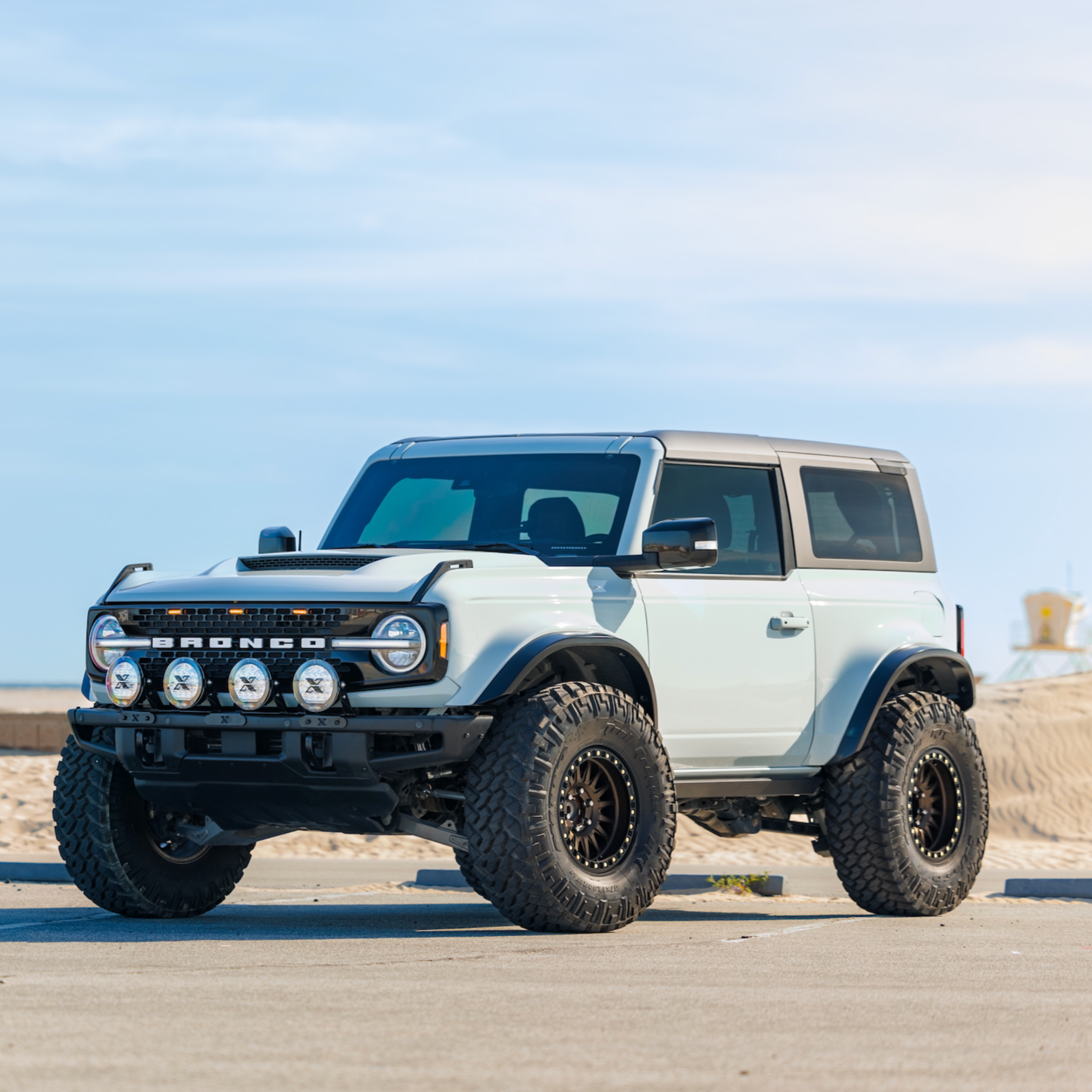 2021-2025 Ford Bronco 2-Door Rear Quarter Kit installed on a modified Bronco with offroad tires and accessories.
