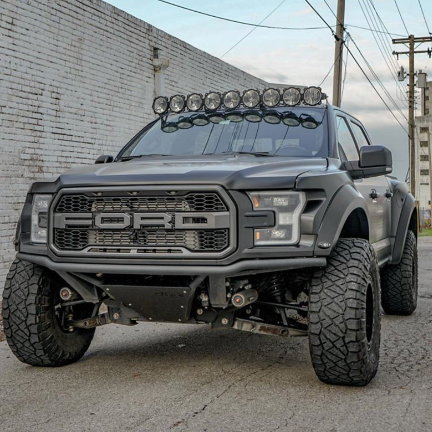 2017-2020 Ford Raptor with custom bedsides, showcasing rugged off-road design and enhanced performance features.