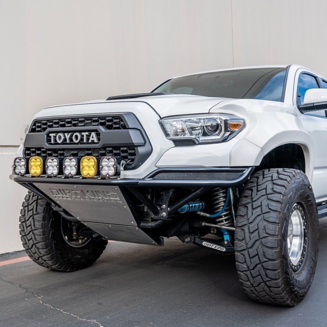 2016-2023 Toyota Tacoma fenders showcasing a lifted truck with offroad accessories and a rugged design.