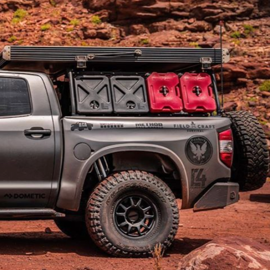2014-2021 Toyota Tundra bedsides installed on a modified truck with offroad accessories in a rugged outdoor setting.