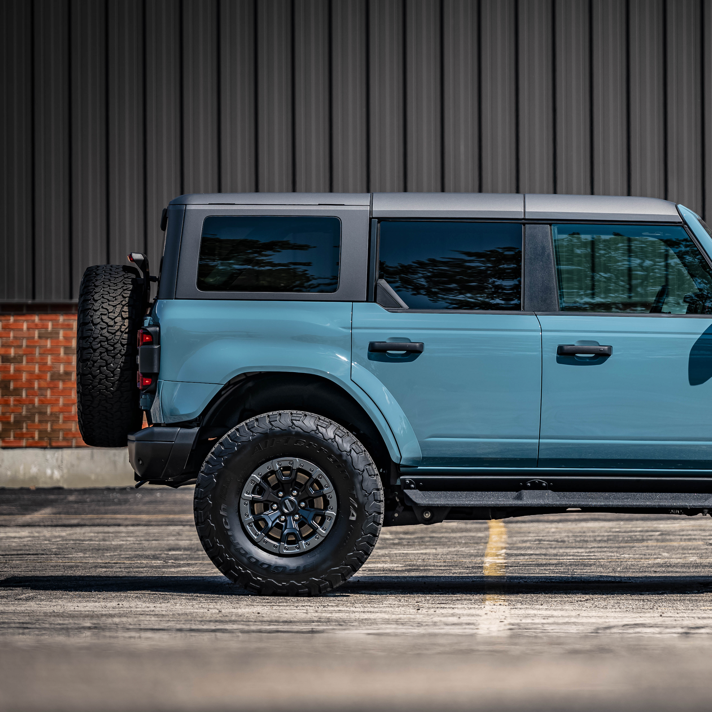 2022-2025 Ford Bronco Raptor with rear quarter kit, showcasing rugged design and off-road capabilities.