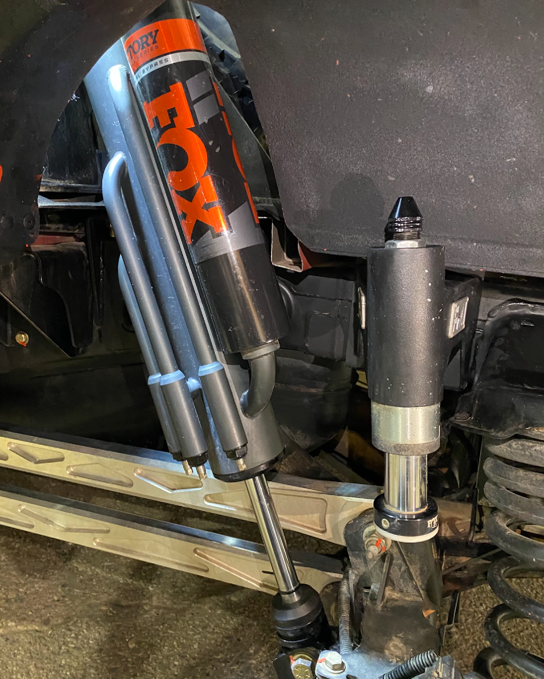 2021+ Raptor 5-Link Rear Bed Organizer featuring 3.0x16 Coil Over and 3.5x16 Bypass Shock for enhanced offroad performance.