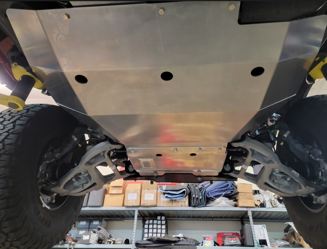 Skid plate installed on a 2022 Ford Bronco Raptor, showcasing undercarriage protection for offroad adventures.