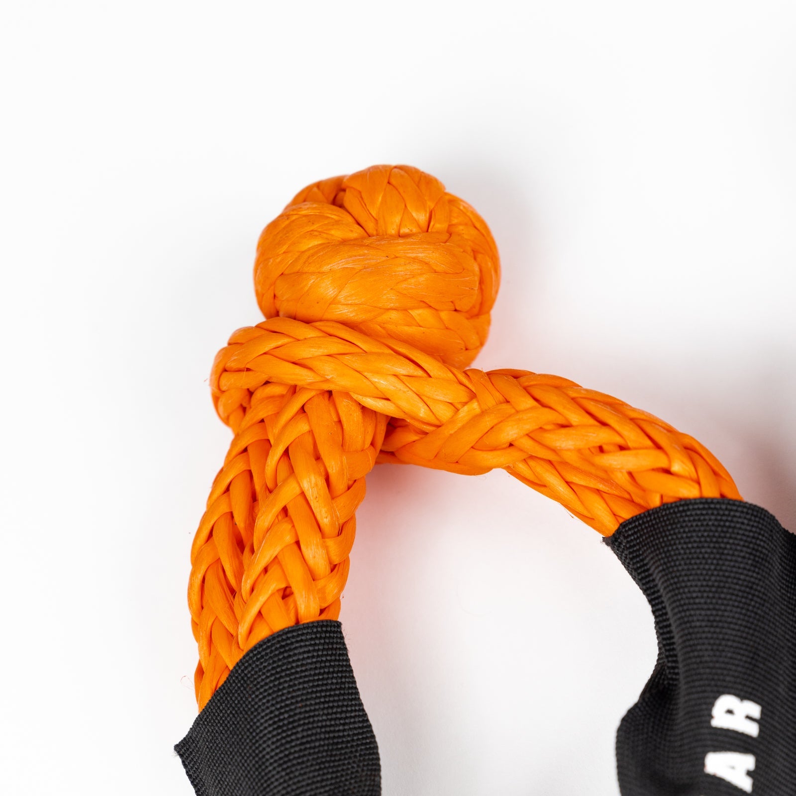 Durable 1/2 inch soft shackle in bright orange, designed for offroad recovery and towing applications.