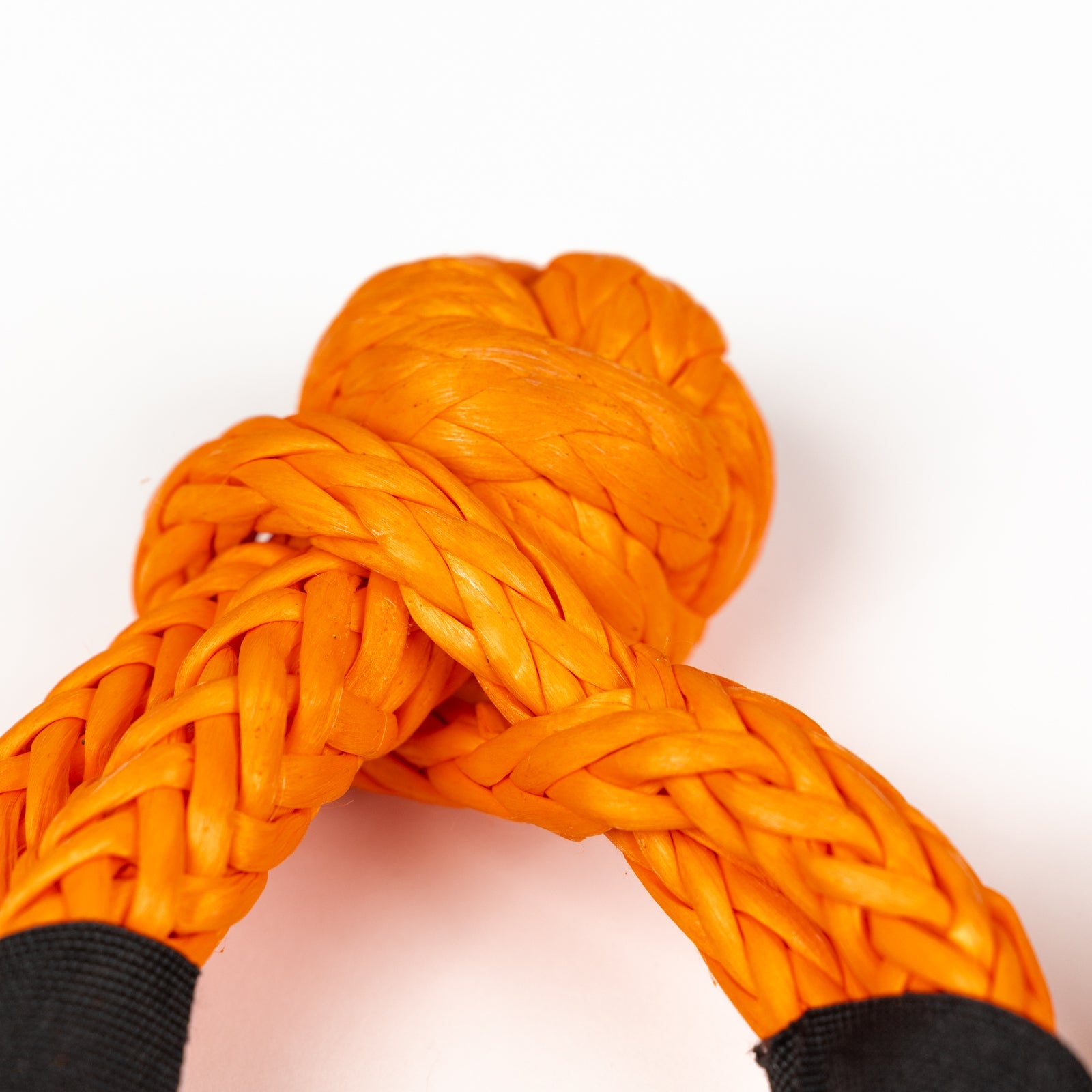 Durable 1/2 inch soft shackle in bright orange, designed for offroad towing and recovery applications.