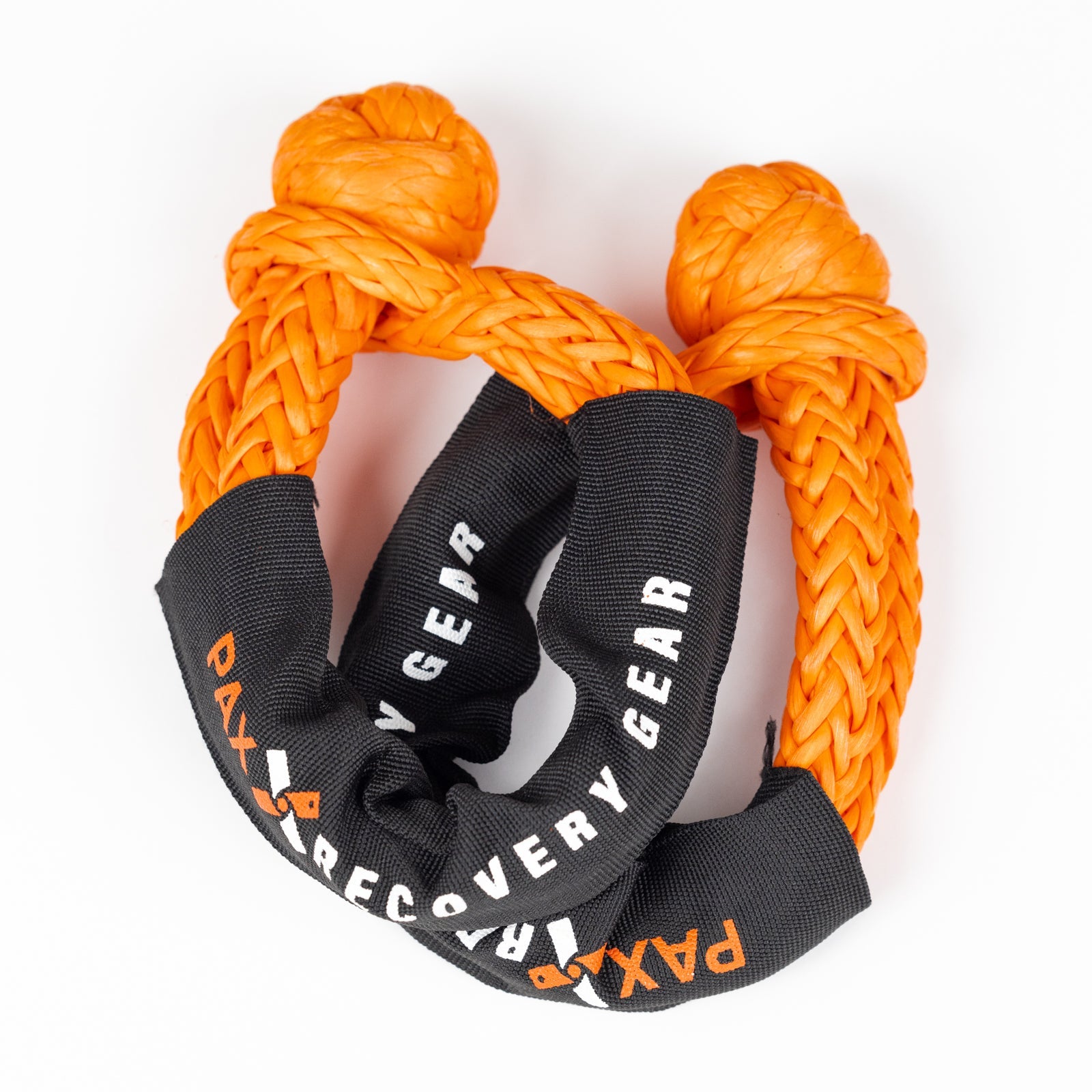 Durable 1/2 inch soft shackle made of braided orange rope, designed for offroad recovery and towing applications.