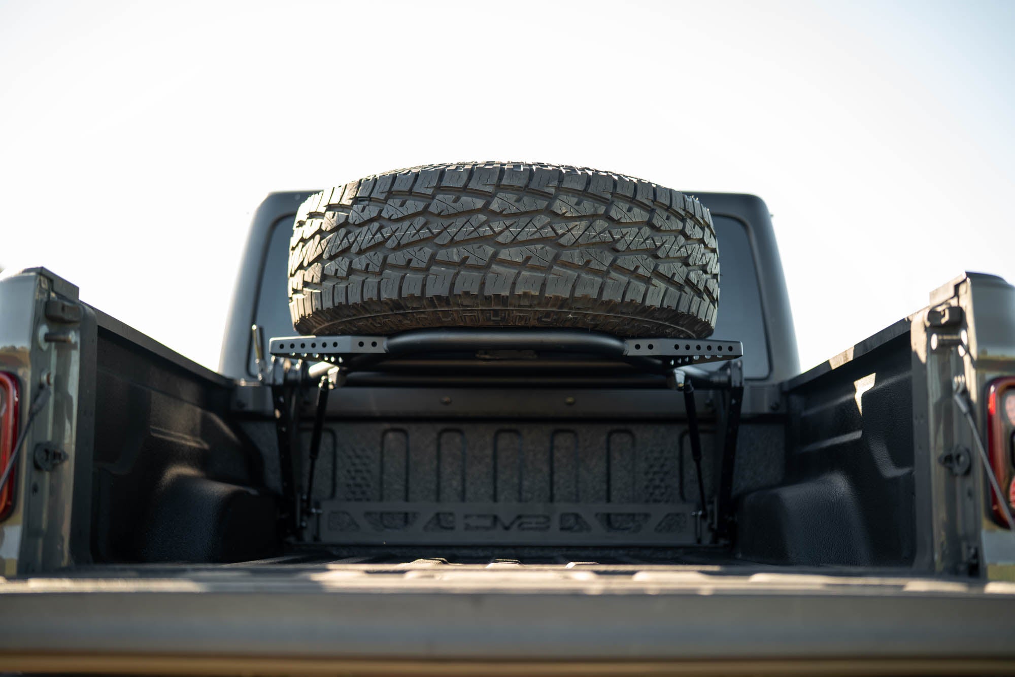 2020 2025 Jeep Gladiator JT Adjustable In Bed Tire Carrier DV8 Offroad