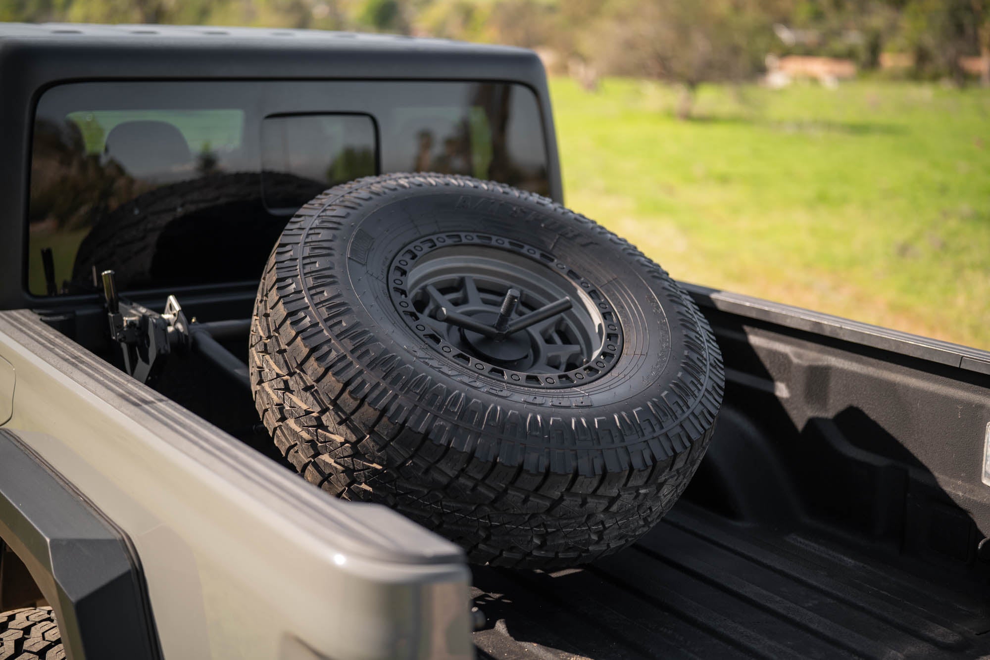 2020 2025 Jeep Gladiator JT Adjustable In Bed Tire Carrier DV8 Offroad