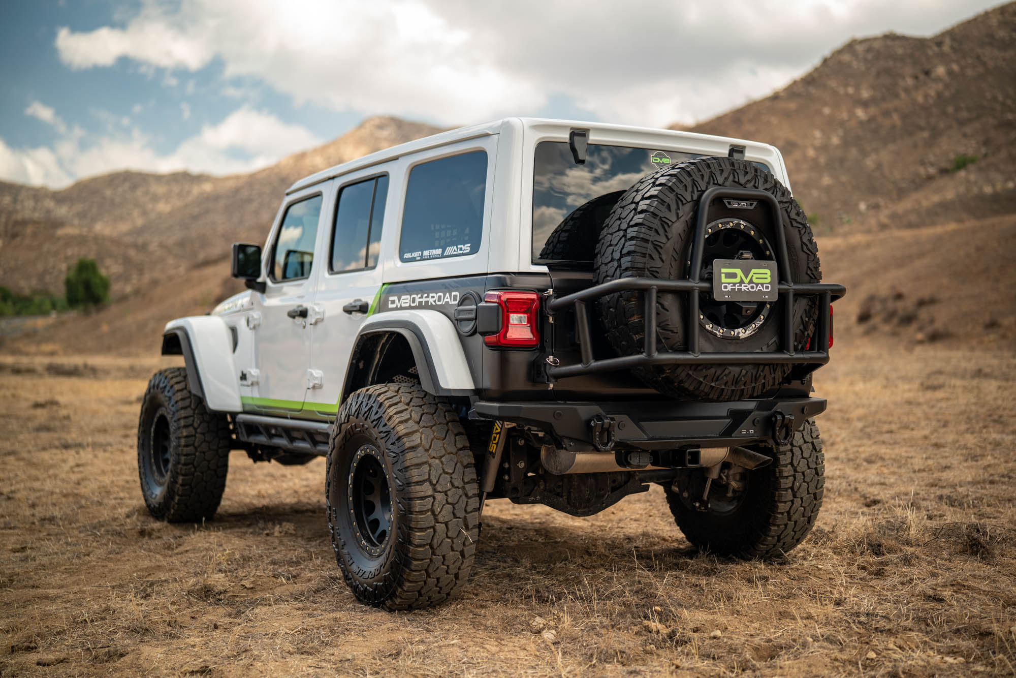 2018 2025 Jeep Wrangler JL Body Mounted Tire Carrier DV8 Offroad