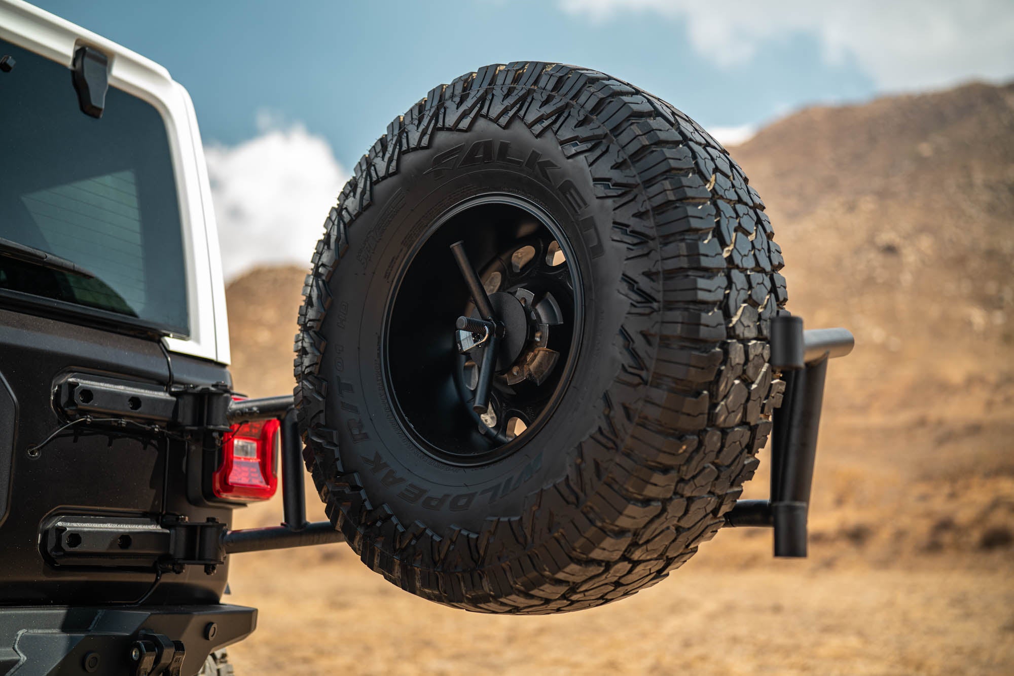 2018 2025 Jeep Wrangler JL Body Mounted Tire Carrier DV8 Offroad