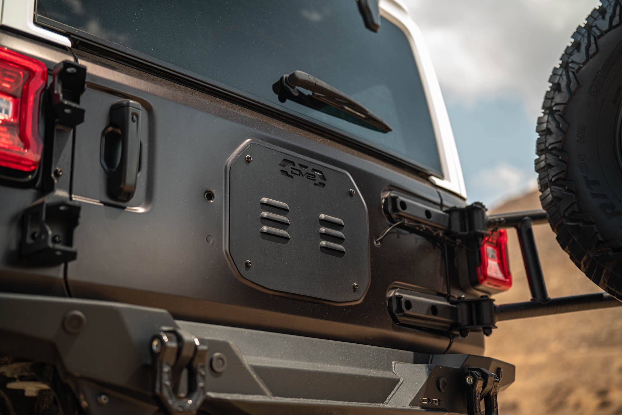 2018 2025 Jeep Wrangler JL Body Mounted Tire Carrier DV8 Offroad