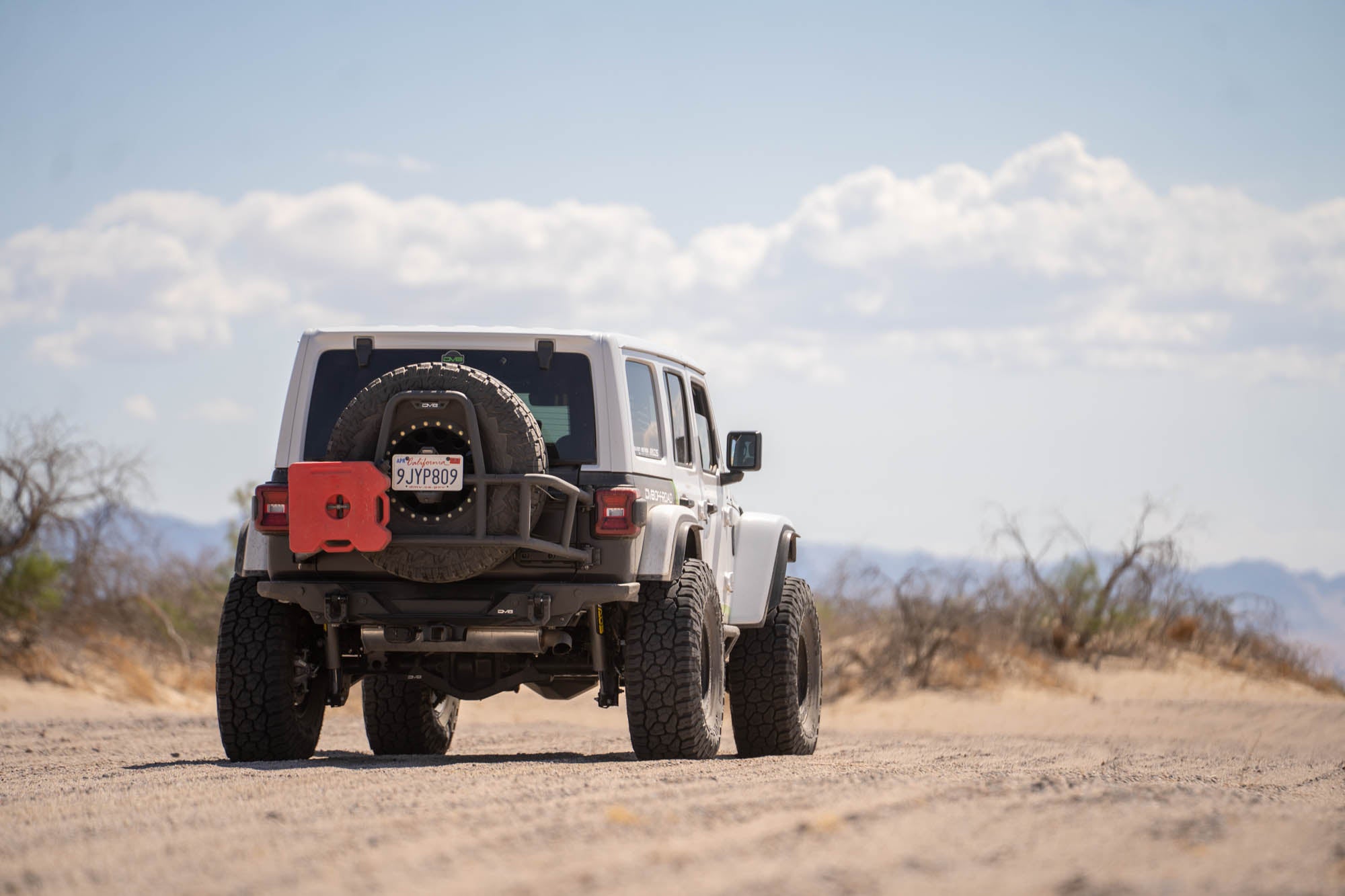 2018 2025 Jeep Wrangler JL Body Mounted Tire Carrier DV8 Offroad