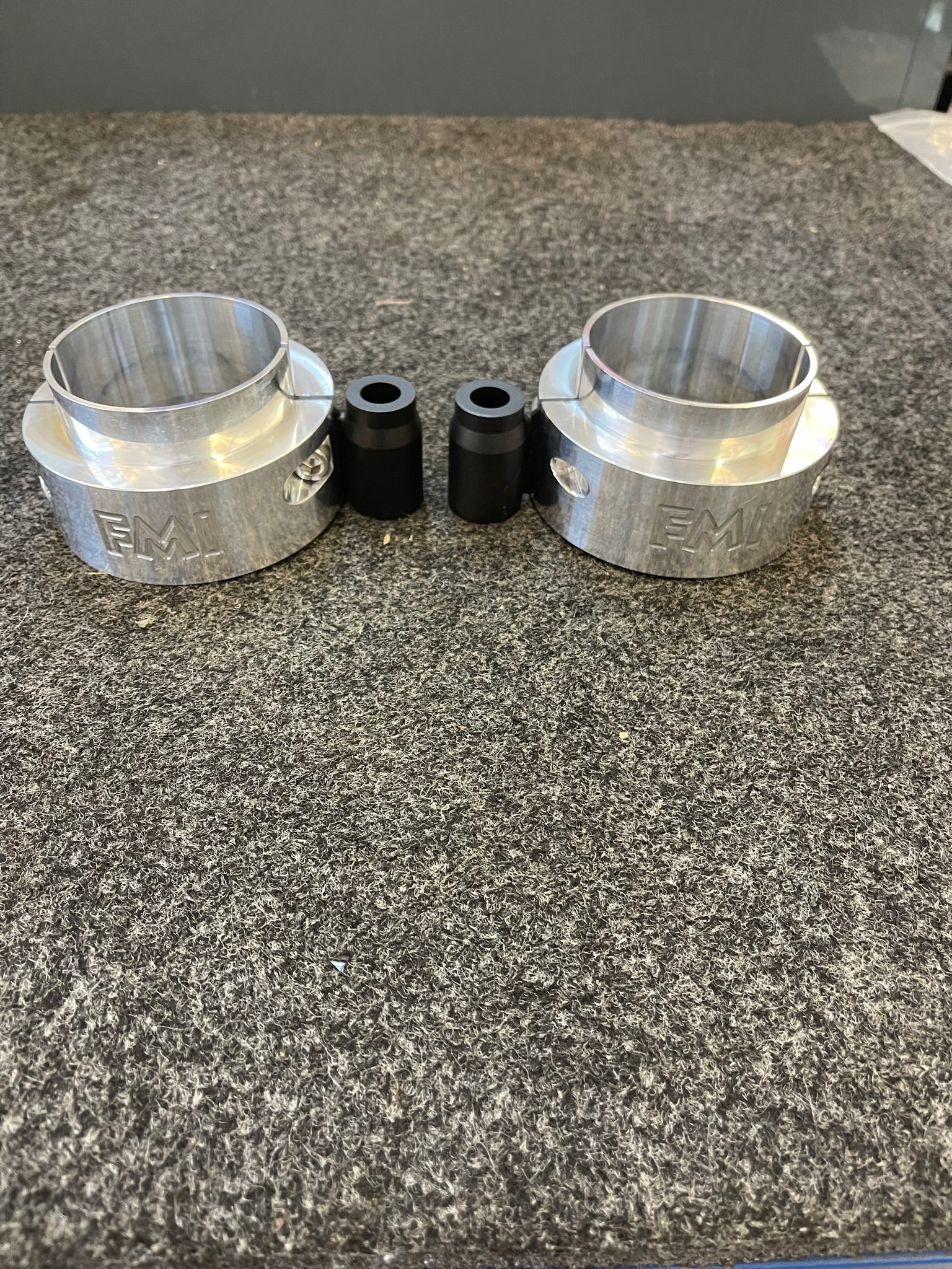 2021-2024 Ram TRX 2-inch front leveling kit featuring aluminum spacers and black rubber components for enhanced suspension.