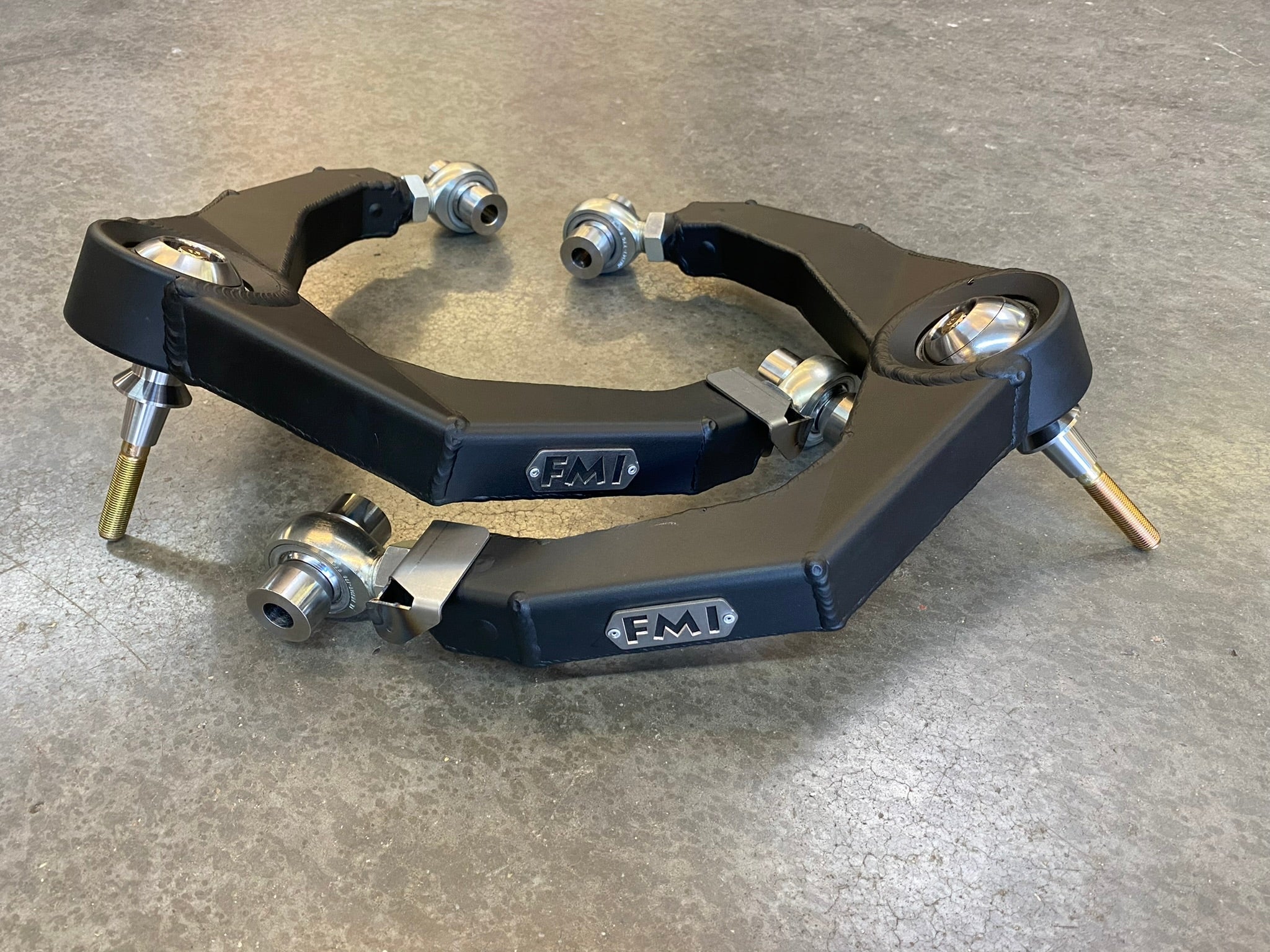 Fabricated upper arm kit for 2021-2024 Ram TRX, designed for enhanced performance and durability in offroad conditions.
