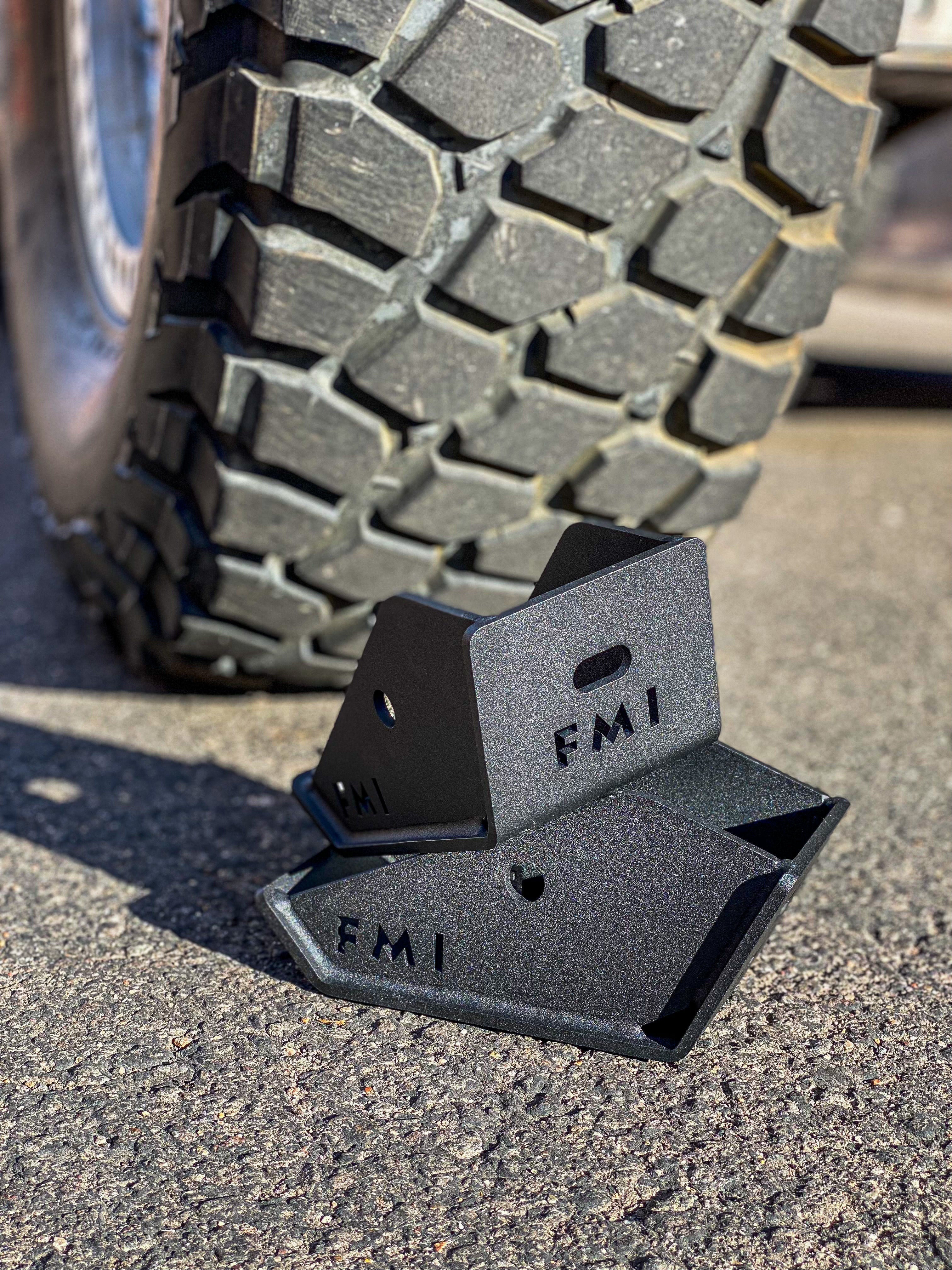 2025 Ram RHO Rear Shock Skid Kit designed for offroad protection, featuring durable black metal construction.