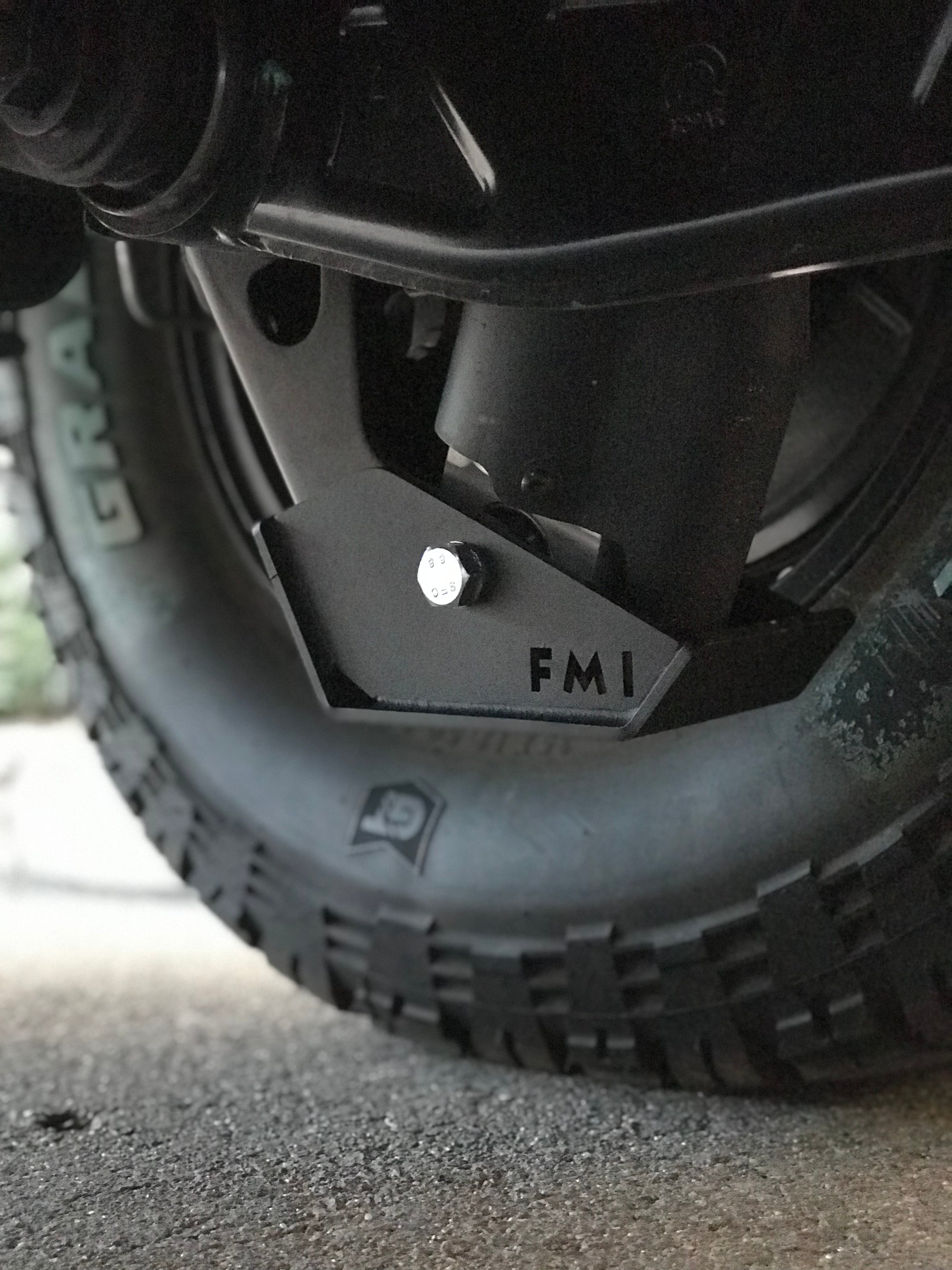 2025 Ram RHO Rear Shock Skid Kit mounted on a truck, providing protection for rear shocks and enhancing off-road durability.