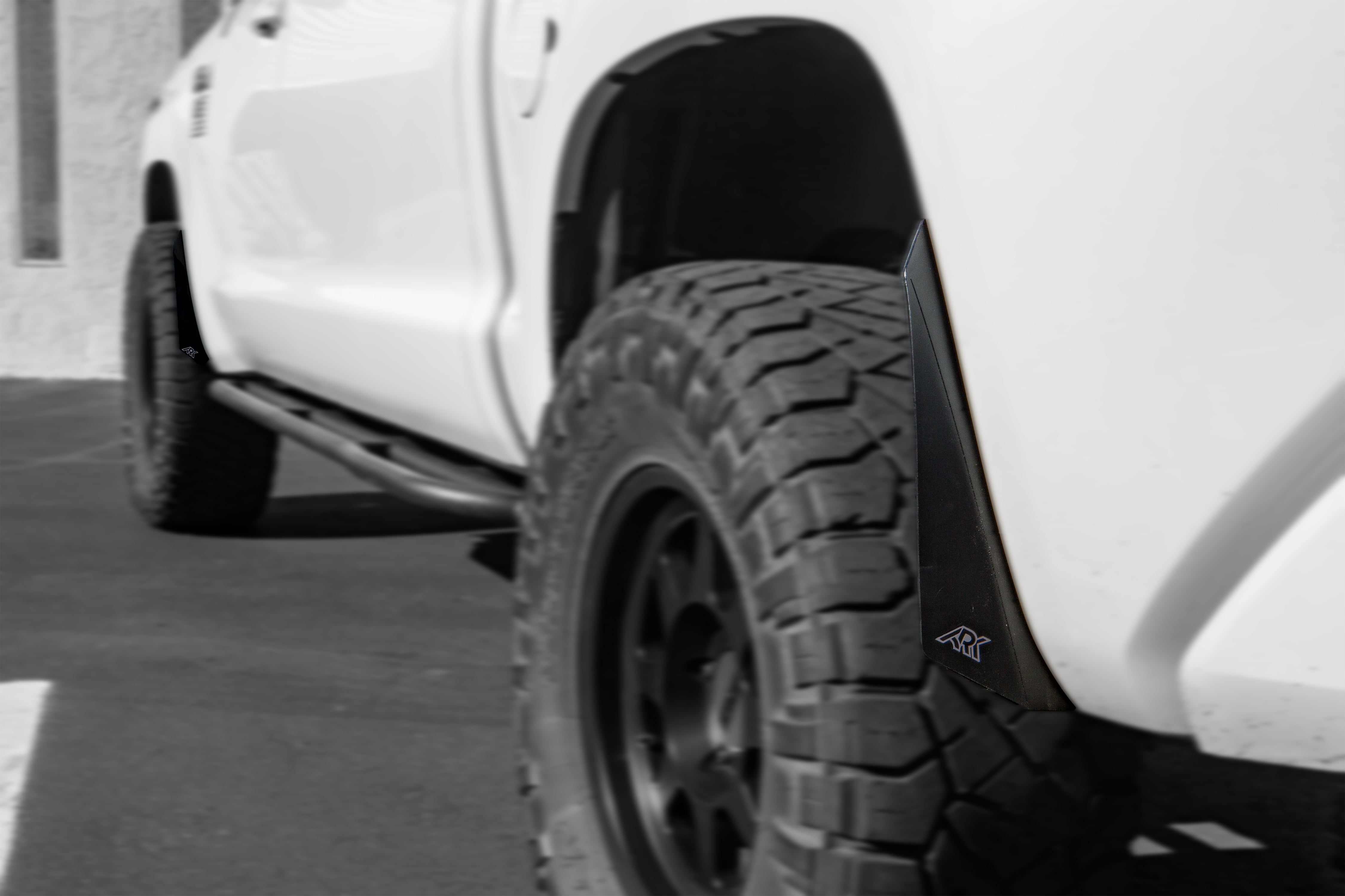 2007-2021 Toyota Tundra TriXpoly Micro Flares installed on a white truck, enhancing off-road style and protection.