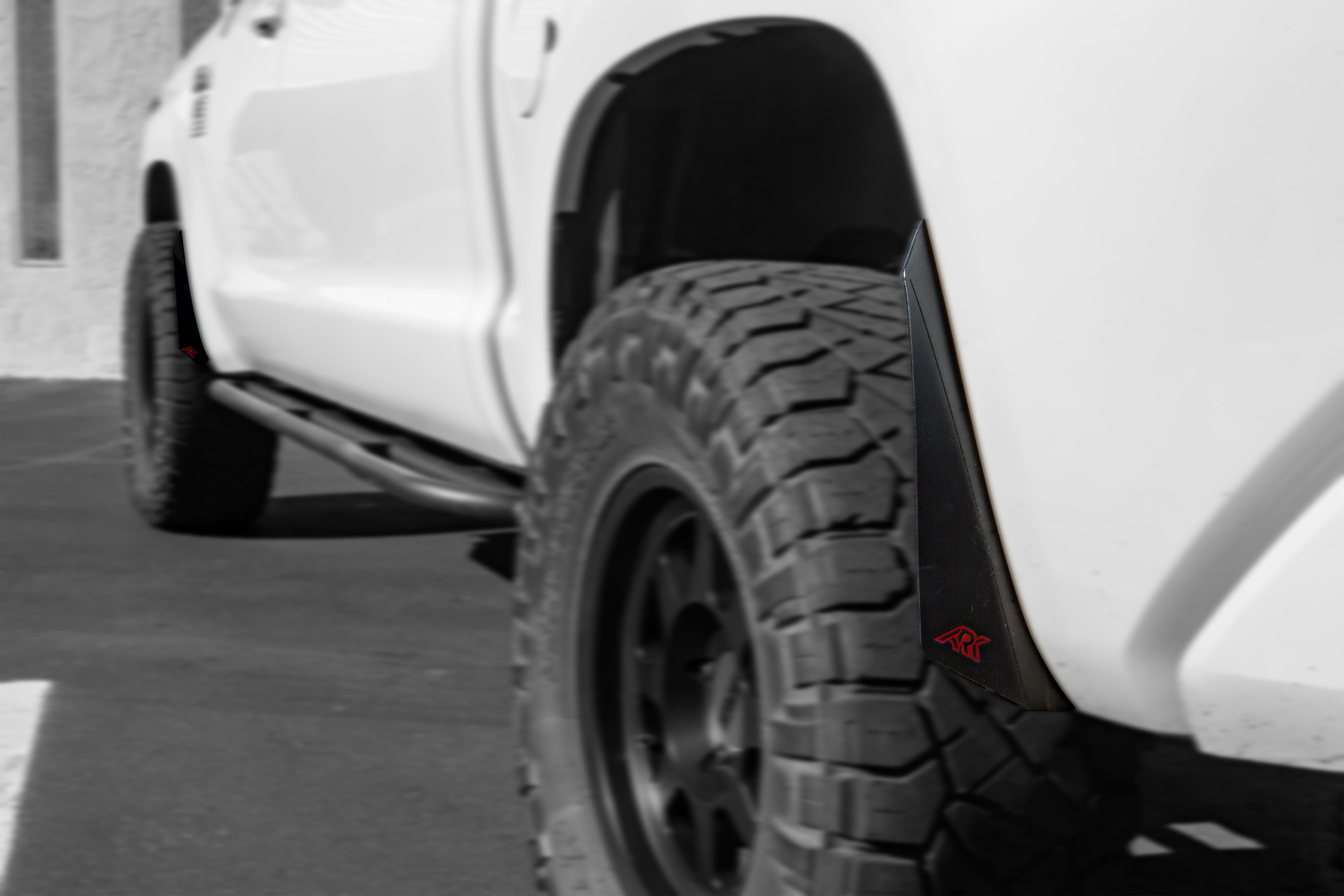 2007-2021 Toyota Tundra TriXpoly Micro Flares installed on a white truck, enhancing tire coverage and style.