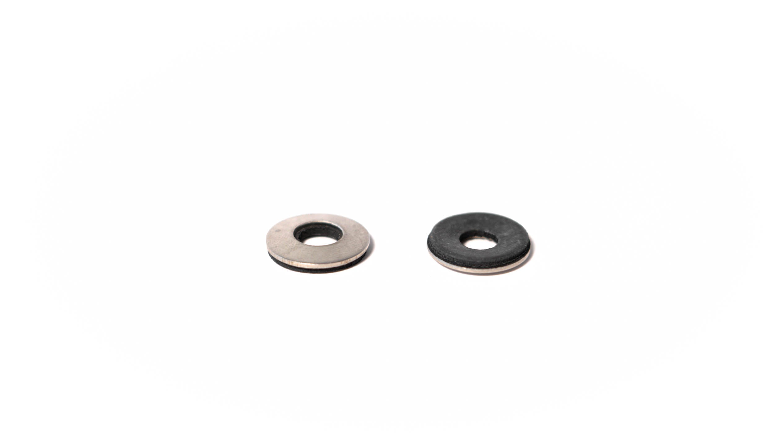 Bonded washers for secure sealing in automotive and industrial applications, featuring metal and rubber components.
