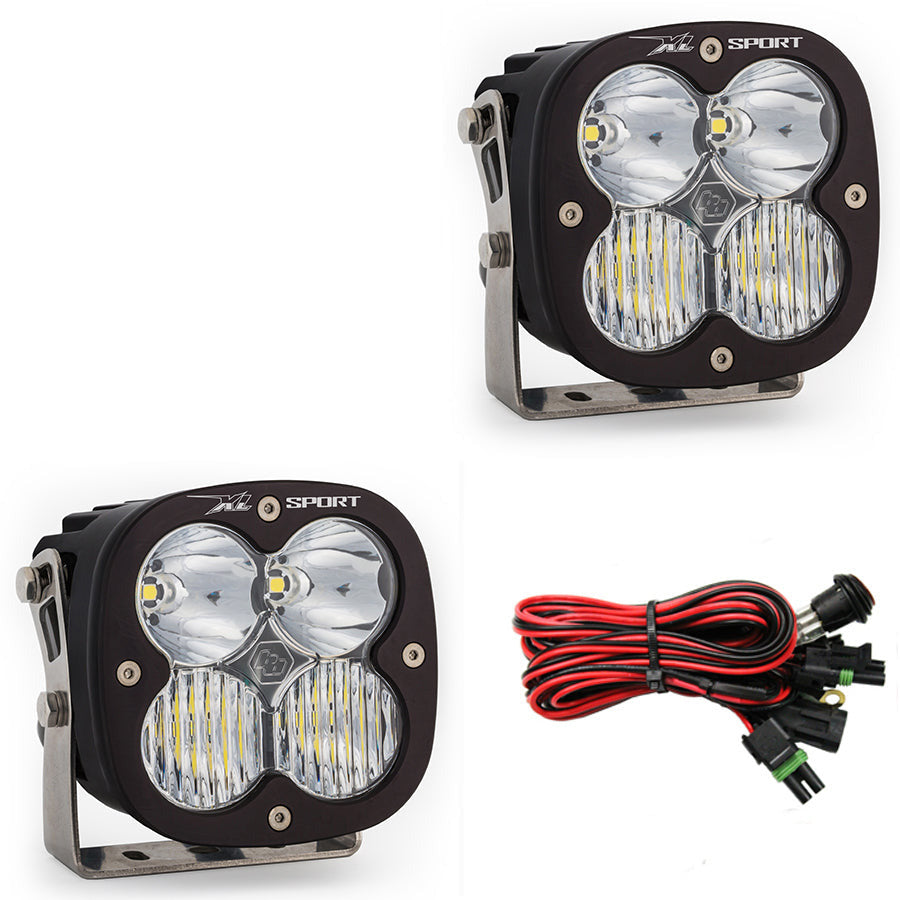 Baja Designs XL Sport LED light pair with mounting brackets and wiring harness for offroad vehicles. High-performance lighting solution.
