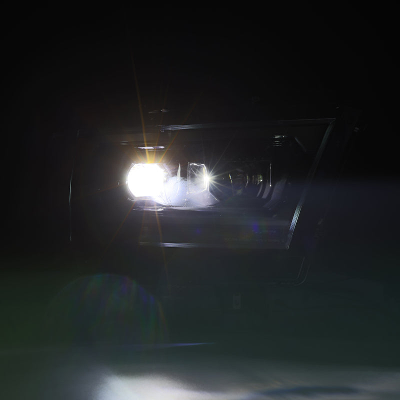 AlphaRex LUXX LED projector headlights for 2019-2022 Ram 1500 in alpha black, showcasing bright illumination and sleek design.