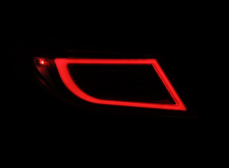 AlphaRex LUXX LED taillights for 22-24 Toyota GR86 in Alpha-Black, showcasing a sleek red light design.