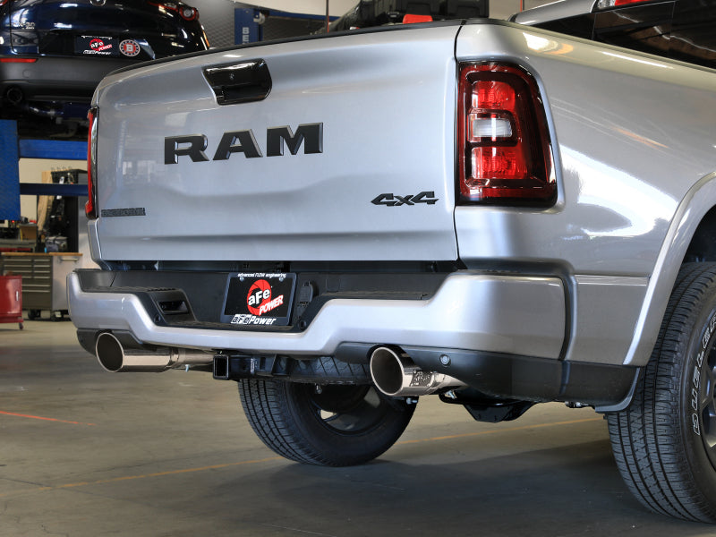 Afe Vulcan Series Cat-Back Exhaust System installed on a 2025 RAM 1500 V6, showcasing dual exhaust tips and rear view.