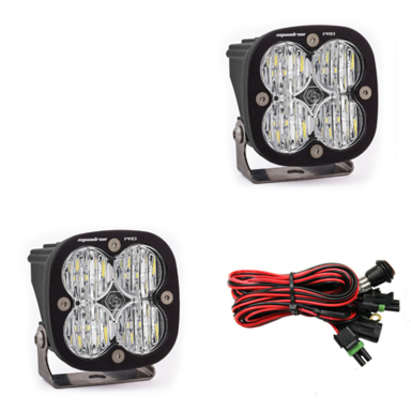 Baja Designs Squadron Pro Series LED light pods with wide cornering pattern, featuring durable housing and wiring harness.