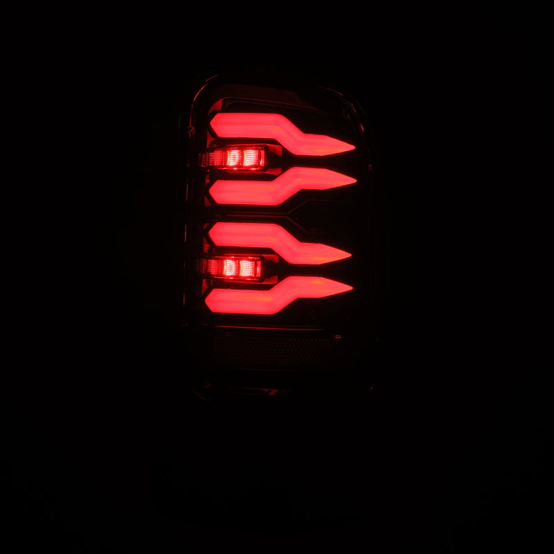 AlphaRex LUXX-Series LED tail lights for 94-01 Dodge Ram 1500/2500/3500 in alpha-black with a sleek design.