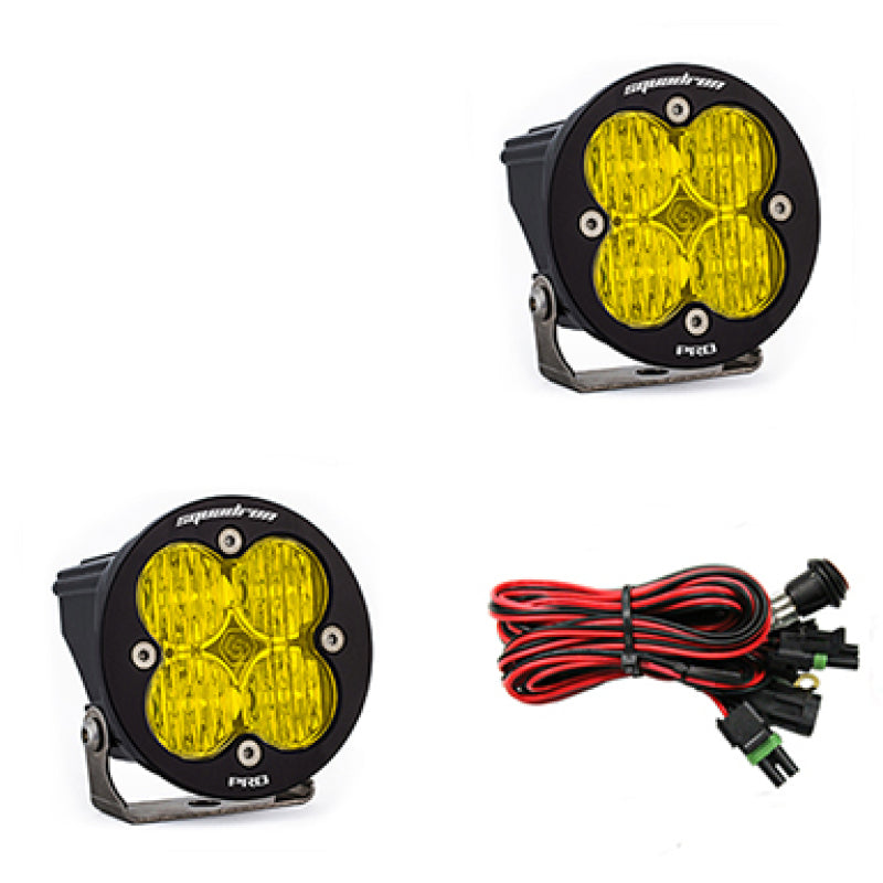 Baja Designs Squadron R Pro Wide Cornering Pair LED light pods in amber, featuring four LED lenses and wiring harness.