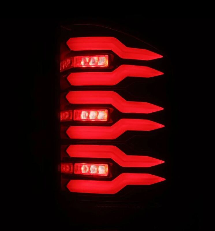 AlphaRex Luxx-Series LED tail lights for 07-14 Chevrolet Silverado, featuring a sleek black and red design.