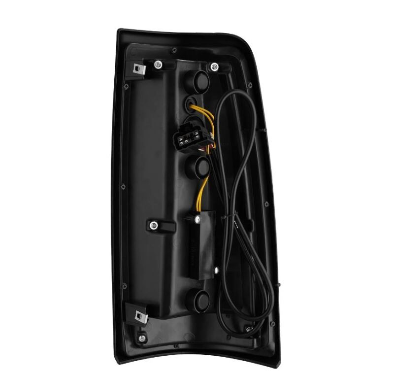 AlphaRex LUXX-Series LED tail lights for 99-06 Chevrolet Silverado and GMC Sierra, featuring a black and red design.