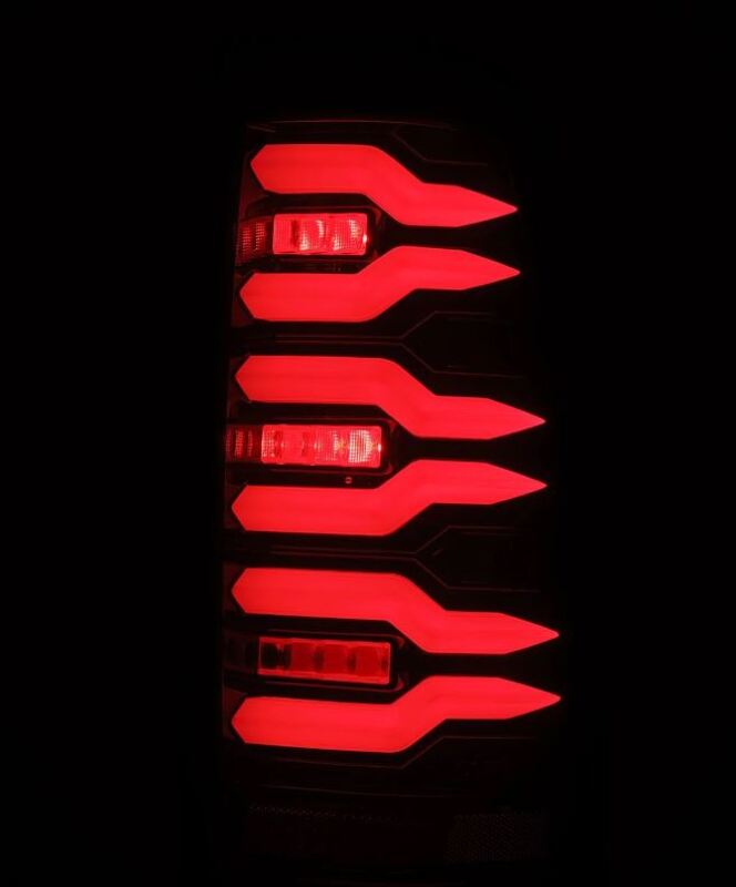 AlphaRex LUXX-Series LED tail lights for 99-06 Chevrolet Silverado and GMC Sierra in black and red design.