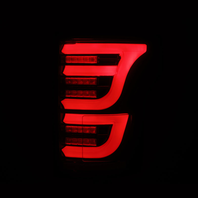 AlphaRex Luxx LED tail lights for 2015-2020 Ford F-150 in black and red, designed for enhanced visibility and style.