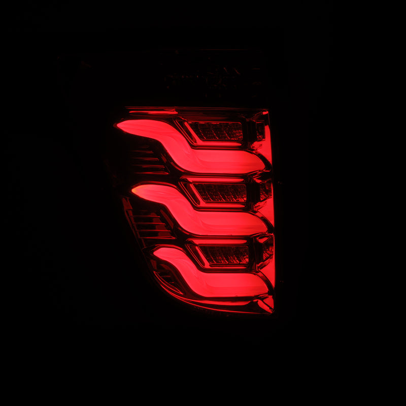 AlphaRex PRO-Series LED tail lights for 11-15 Ford Explorer in red smoke finish, showcasing a sleek and modern design.