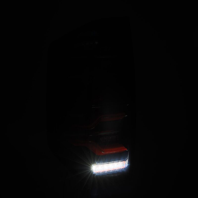 AlphaRex LUXX LED taillights for 14-21 Toyota Tundra in black and red with sequential signal and activation light.