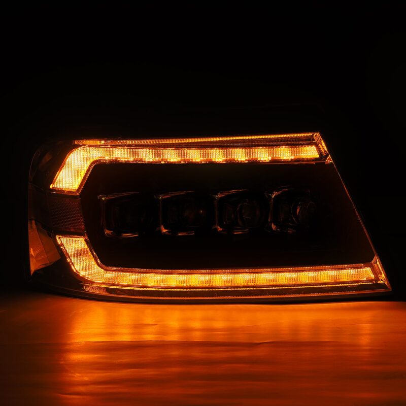AlphaRex NOVA-Series LED projector headlight for 04-08 Ford F-150, featuring sequential signal and active lighting in black.