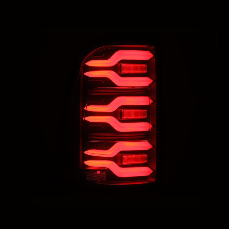 AlphaRex Luxx-Series LED tail lights for 19-21 Dodge Ram 1500 in black with sequential signal and active light features.