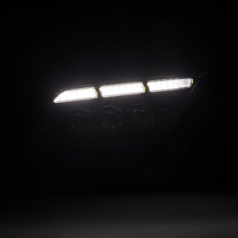 AlphaRex NOVA-Series LED projector headlights for 2013-2014 Ford Mustang, featuring black housing, sequential signals, and daytime running lights.