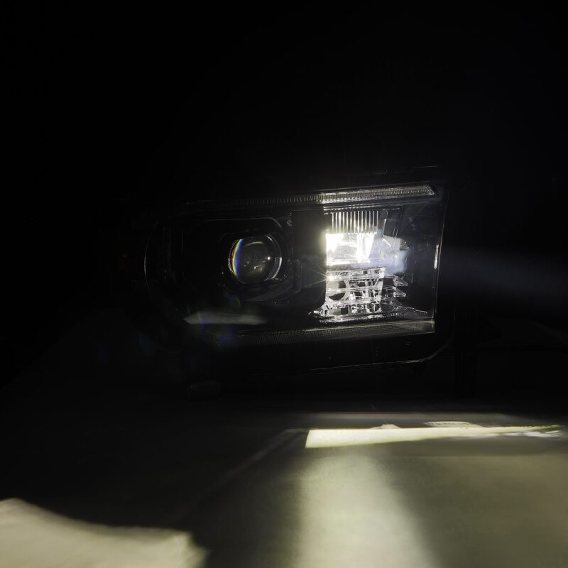 AlphaRex LUXX-Series LED projector headlight for 07-13 Toyota Tundra and 08-17 Sequoia, showcasing active light sequence and DRL.